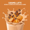 Caramel latte with coffee beans and caramel pieces on an orange background